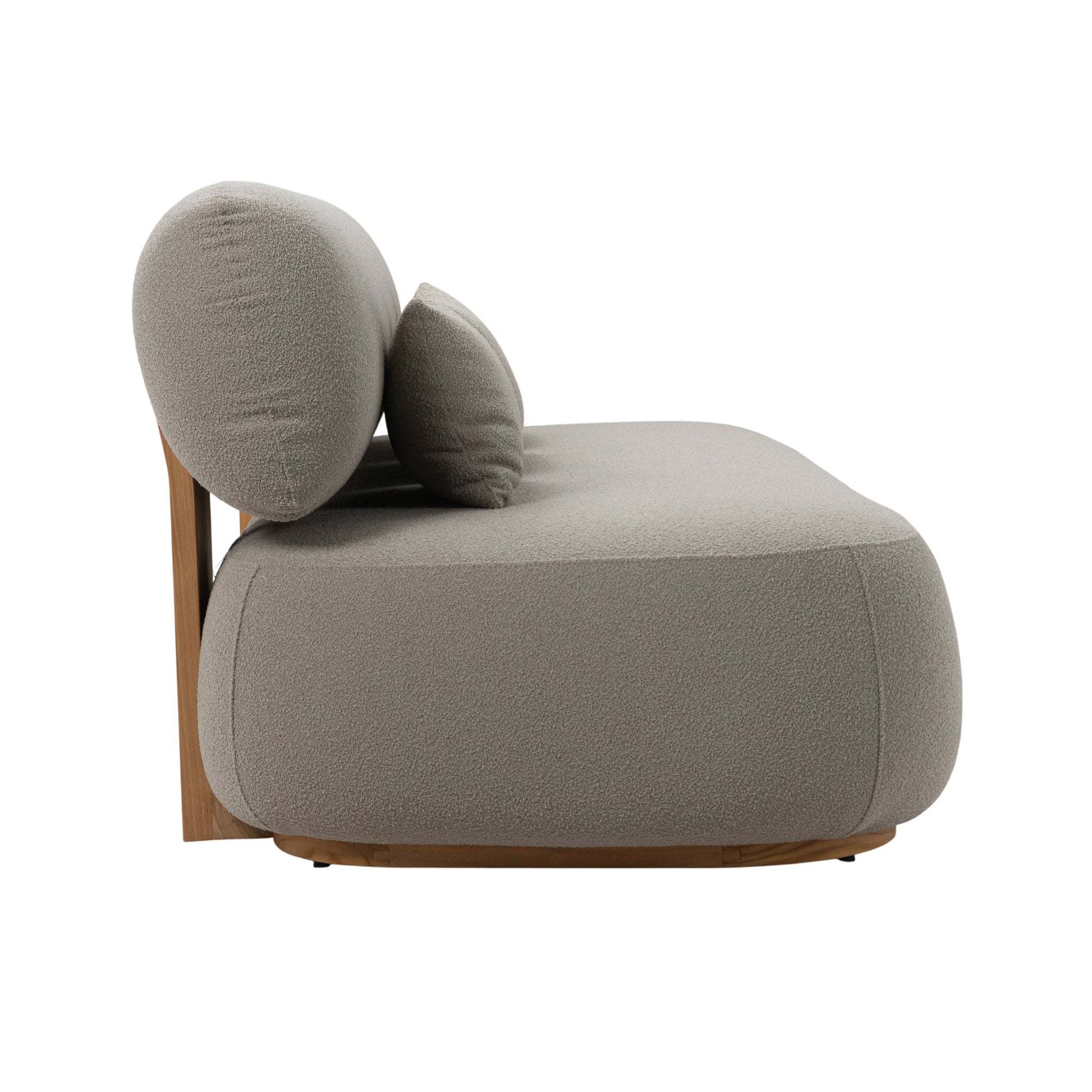 Menton teak 3-seater sofa with teak wood frame and deep plush seating and back rest. With three pillow cushions. Side view.