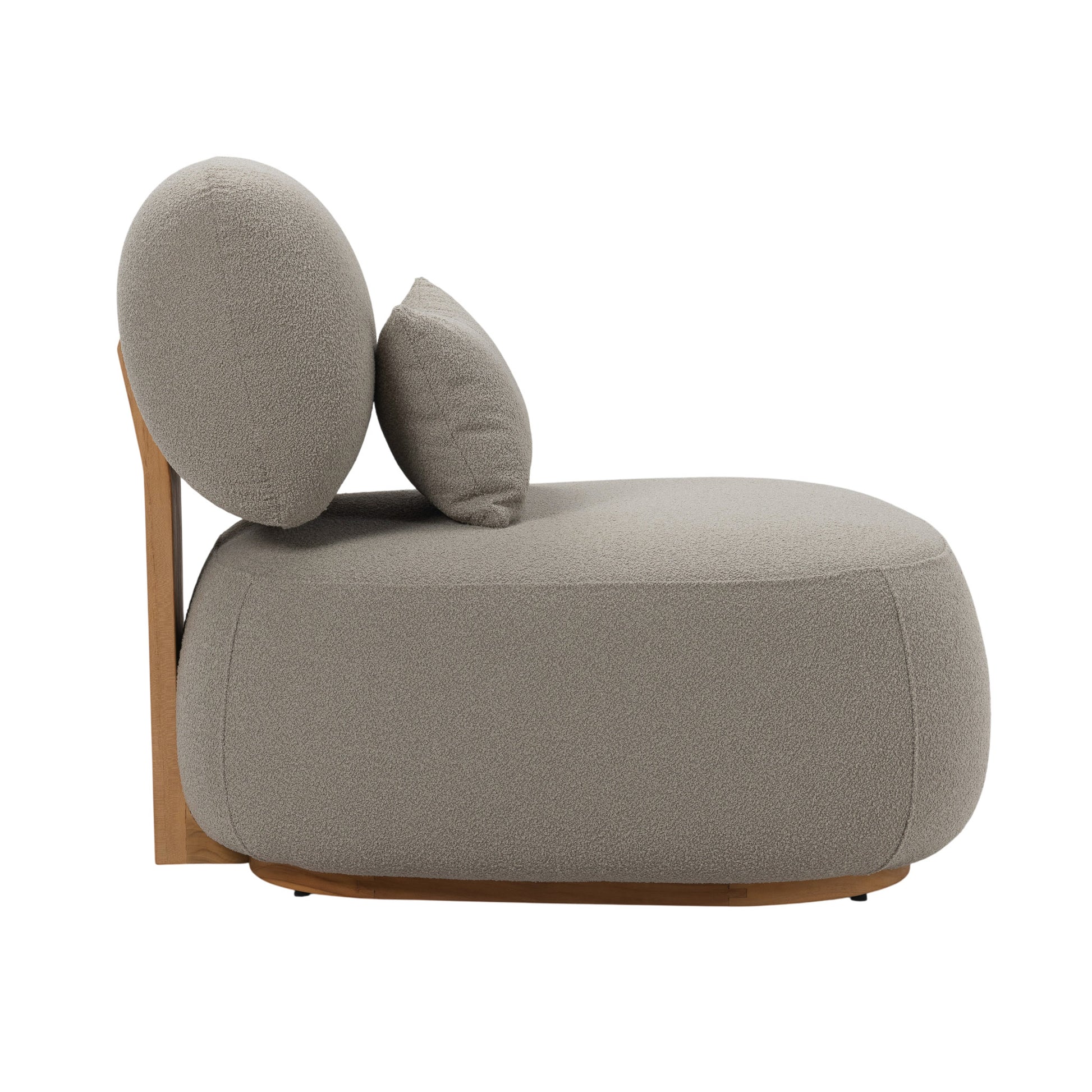 Menton teak lounge chair. Side view.