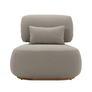 Menton teak lounge chair. Front view.