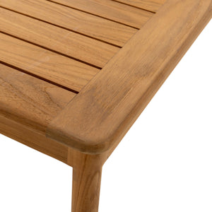 Close-up of Miami outdoor table showing natural teak grain, slatted tabletop and rounded timber edging