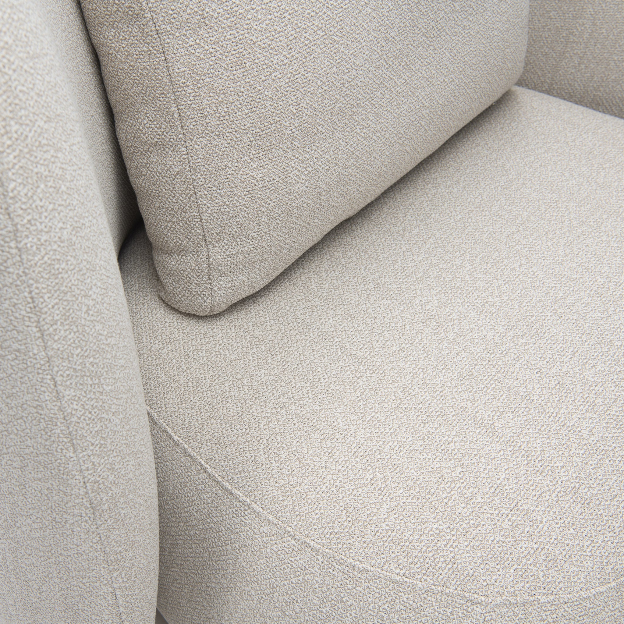 Closeup of Monaco high back lounge chair seating, arms and pillow cushion. 