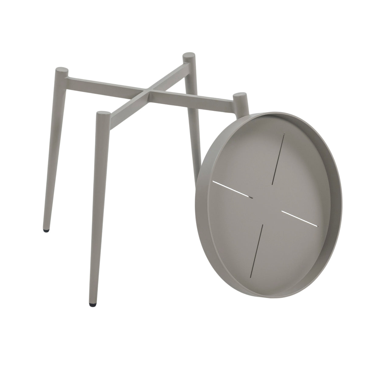 An aluminium side table with a moon-shaped removable tray on it's side. Leaning on four legs with a white background. 