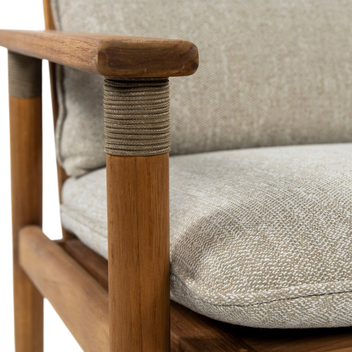 Close-up detail of a wooden armchair with a woven rope wrap around the arm post and light beige textured fabric cushions.