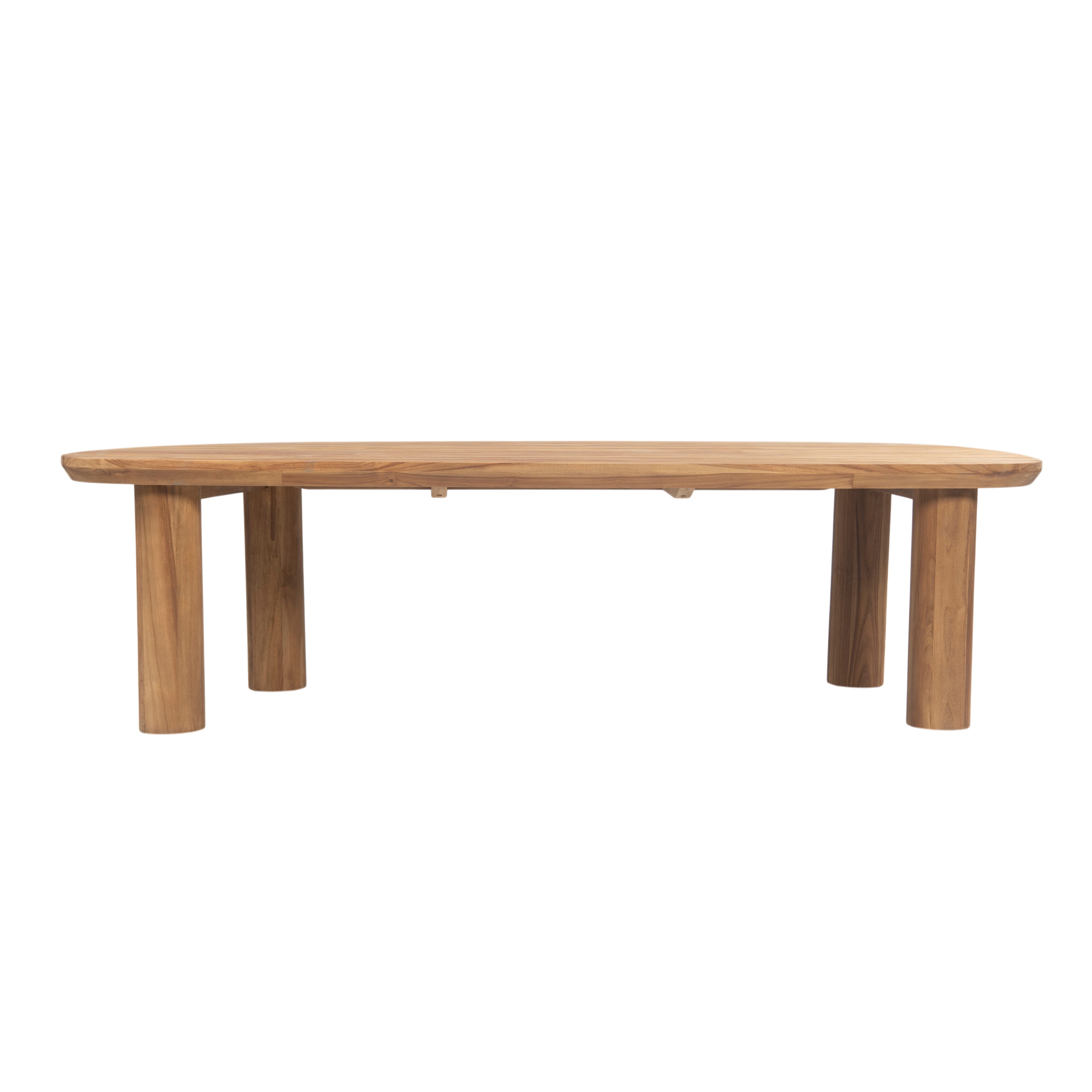 A modern low-profile oval coffee table made of natural light brown wood, featuring a smooth tabletop and four cylindrical legs, shown against a plain white background.