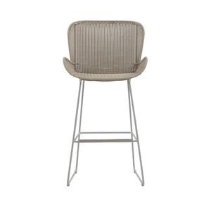 Nairobi Outdoor Bar Stool in Greige / Linen with woven resin wicker seat, curved backrest, integrated armrests and powder-coated aluminium frame. Front view.
