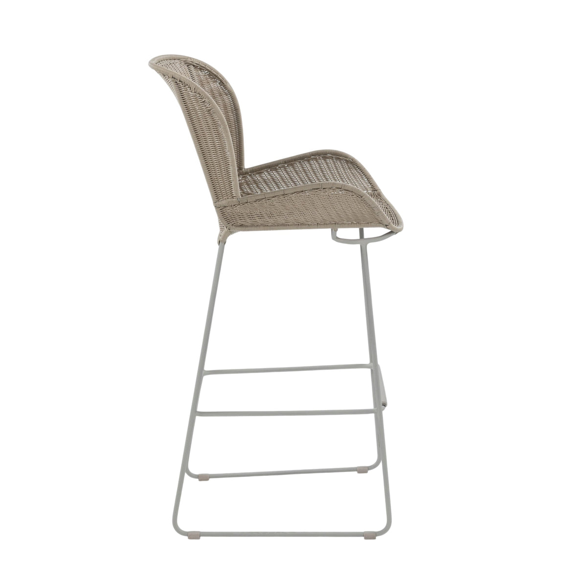 Nairobi Outdoor Bar Stool in Greige / Linen with woven resin wicker seat, curved backrest, integrated armrests and powder-coated aluminium frame. Side view.