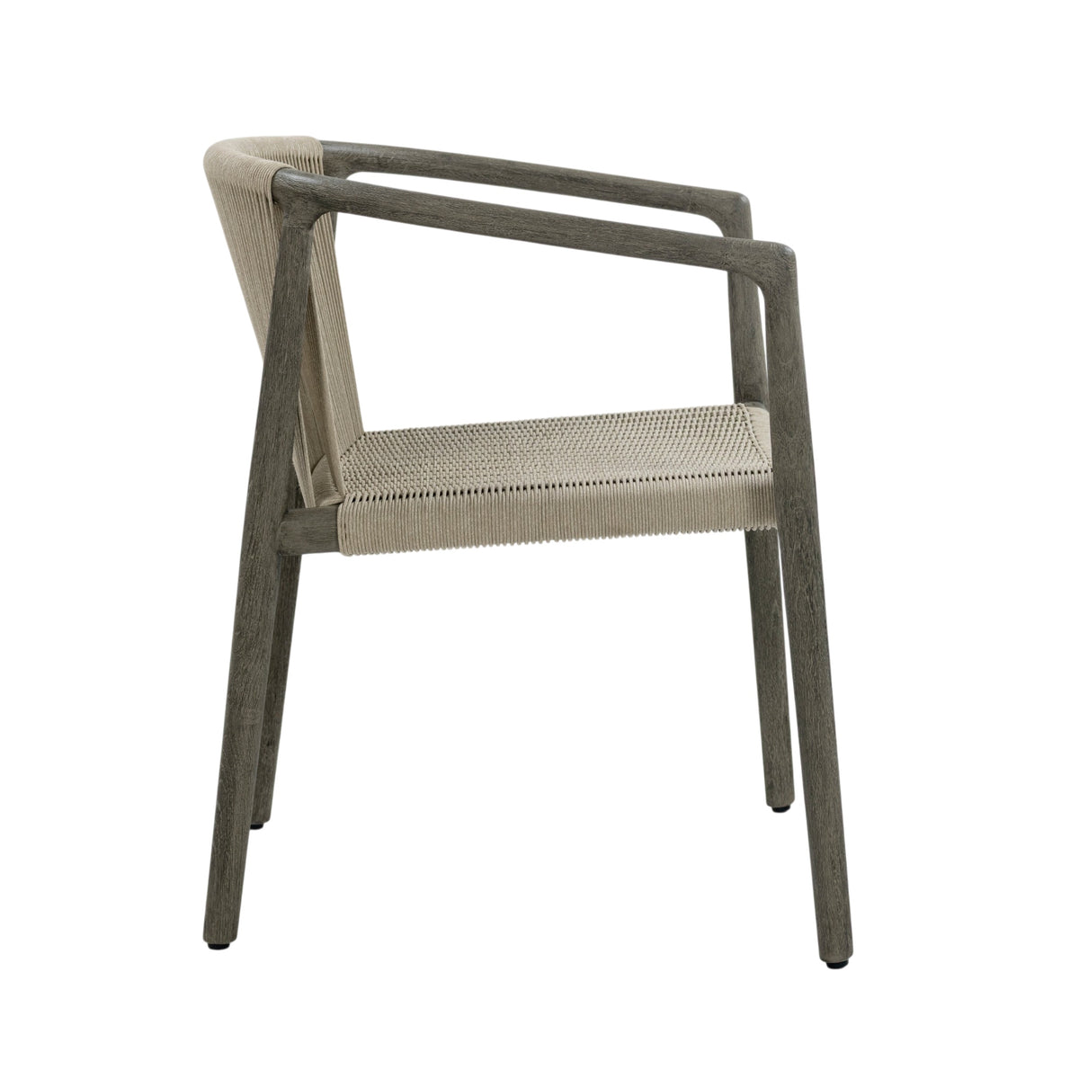 Side view of Palma outdoor dining armchair showing slender teak legs, curved armrests and woven rope seating