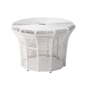 A white octagonal metal outdoor side table with a slatted design and small metal feet, shown on a plain white background.