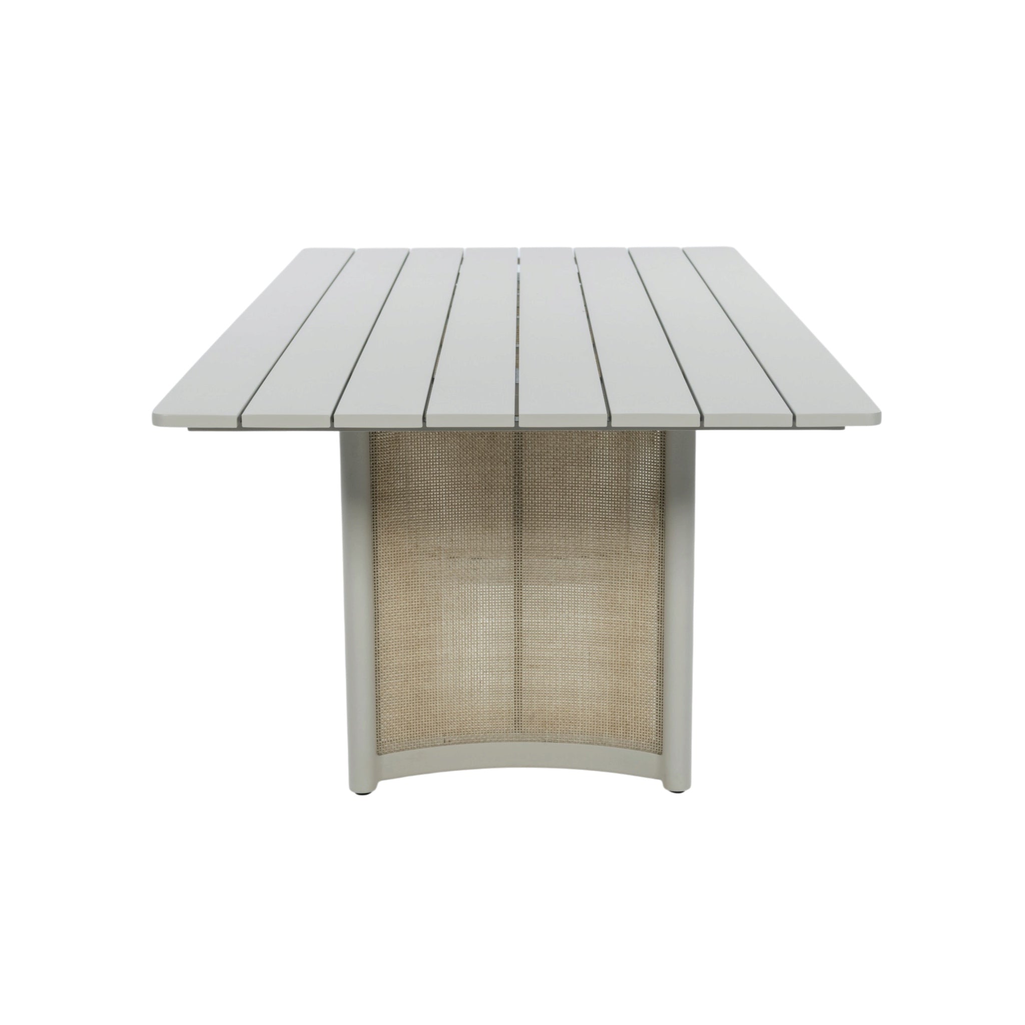 Elevated end view of Porto dining table highlighting the aluminium tabletop slats and woven wicker support