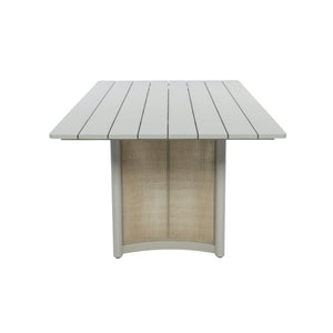 Elevated end view of Porto dining table highlighting the aluminium tabletop slats and woven wicker support