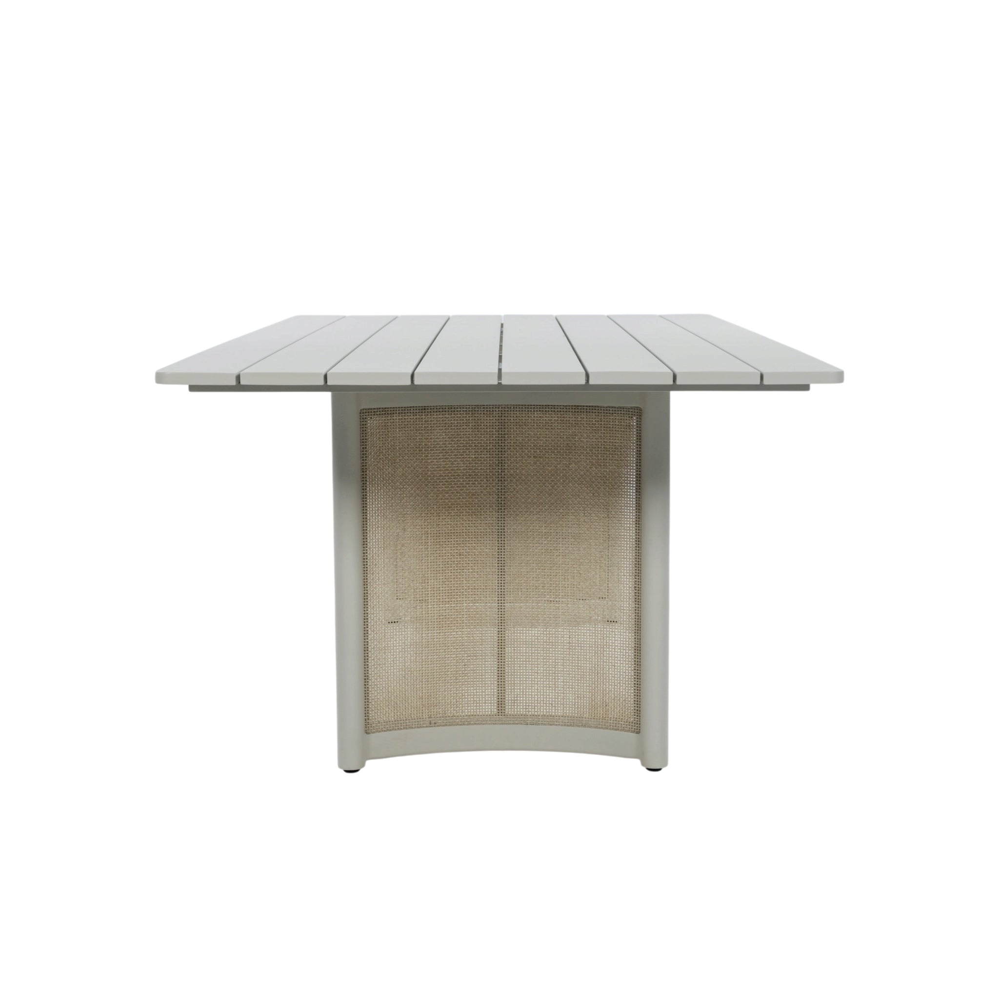 End view of Porto outdoor dining table showing slatted aluminium tabletop and curved woven wicker pedestal panel