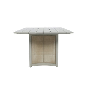 End view of Porto outdoor dining table showing slatted aluminium tabletop and curved woven wicker pedestal panel