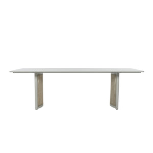 Side profile of Porto 240 cm outdoor dining table showing its elongated slatted aluminium tabletop and two pedestal supports