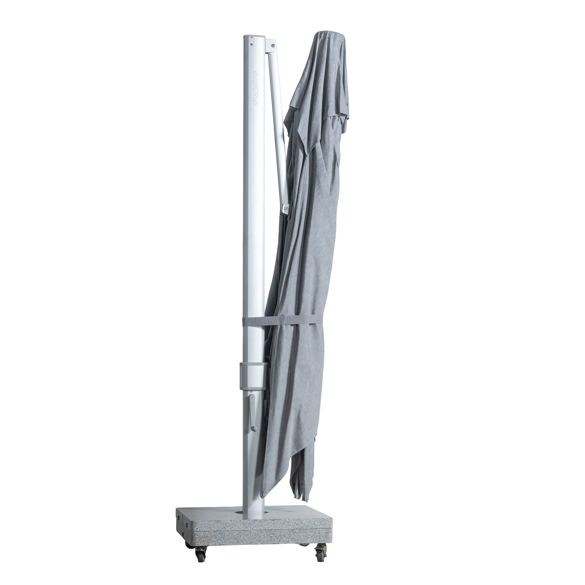 Portofino square cantilever umbrella with large grey canopy collapsed for convenient storage.