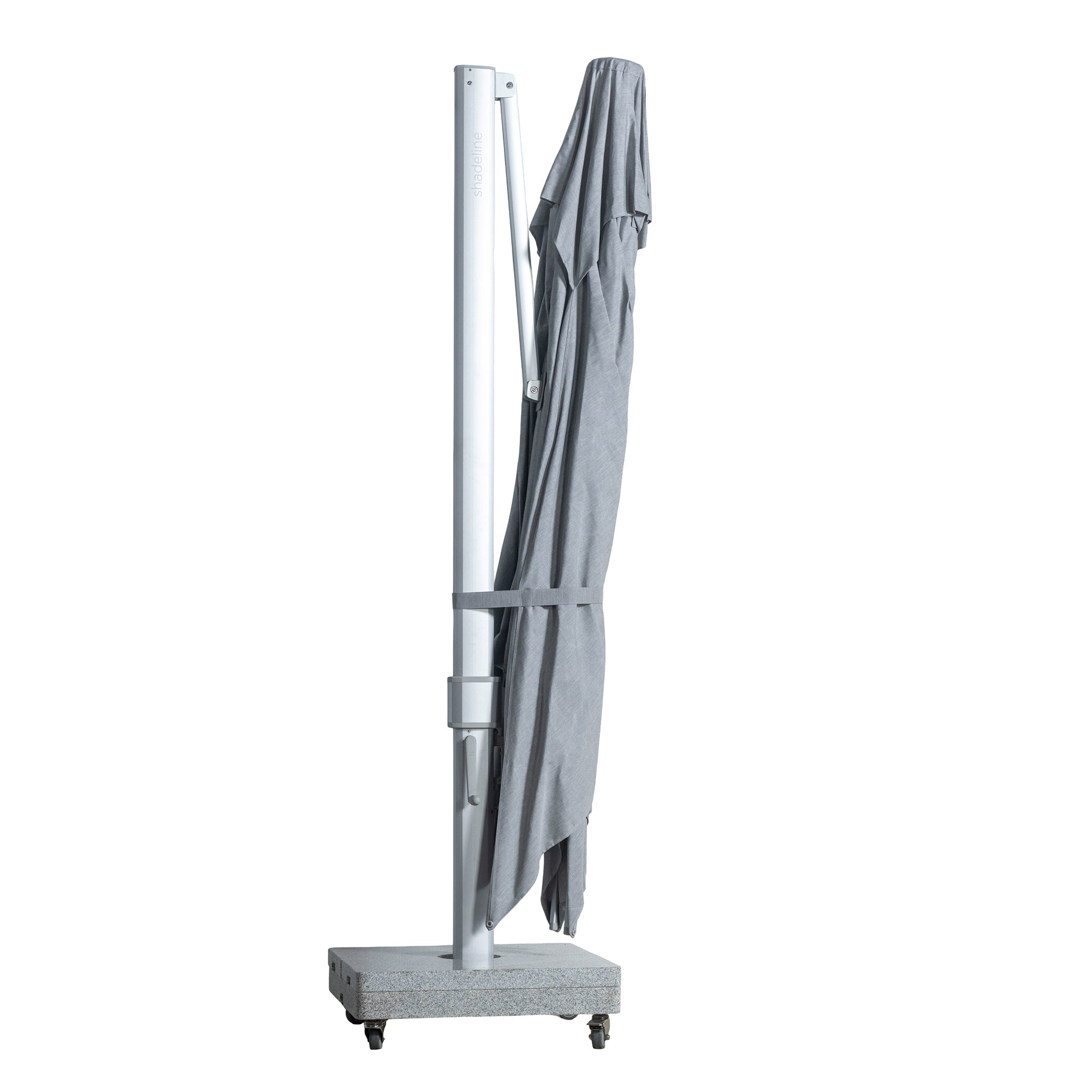 Portofino square cantilever umbrella with large grey canopy collapsed for convenient storage.