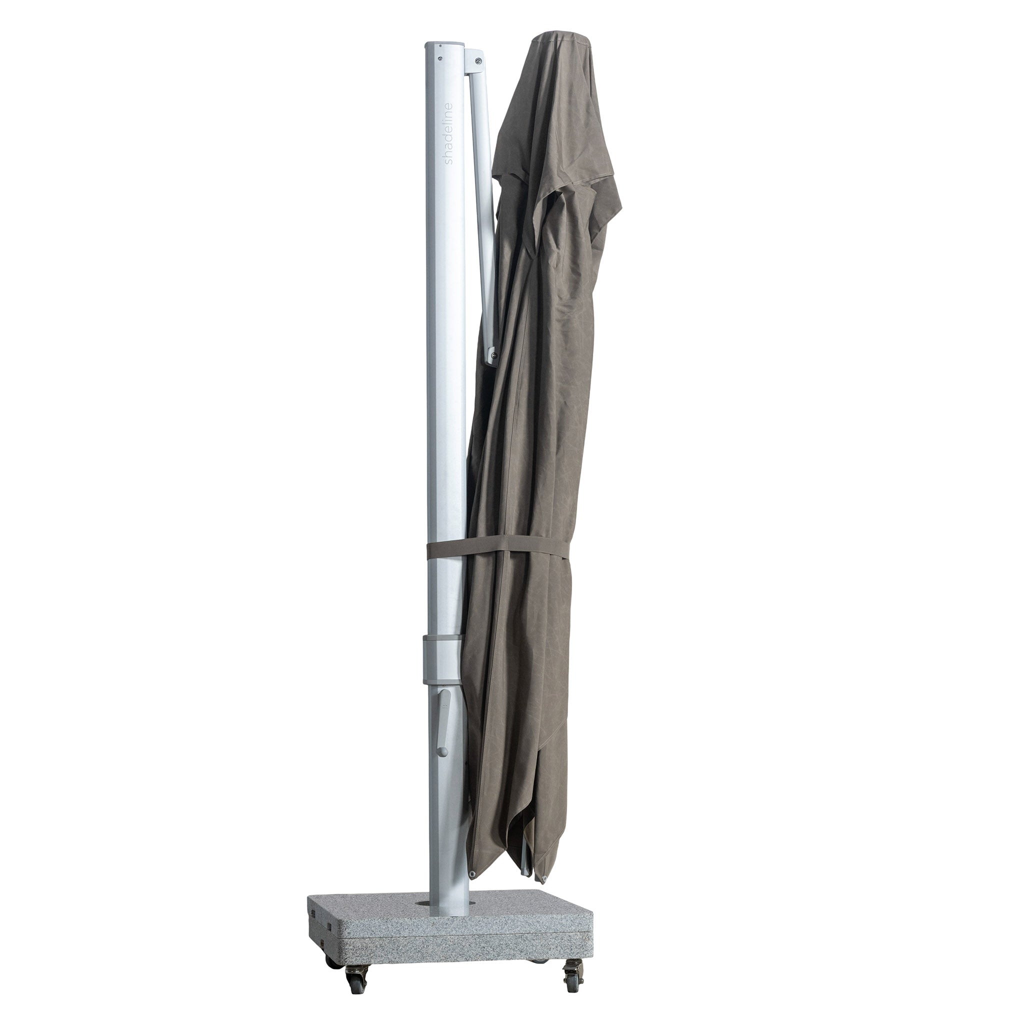 Portofino square cantilever umbrella with large taupe canopy collapsed for convenient storage.