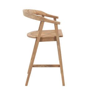 A natural wood bar stool with a curved backrest, slatted seat, and angled legs, shown from a side profile on a solid white background.