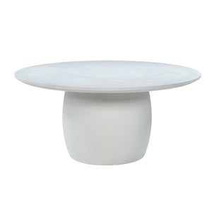 San Remo outdoor round dining table in white colour with a concrete look shown in a white background.