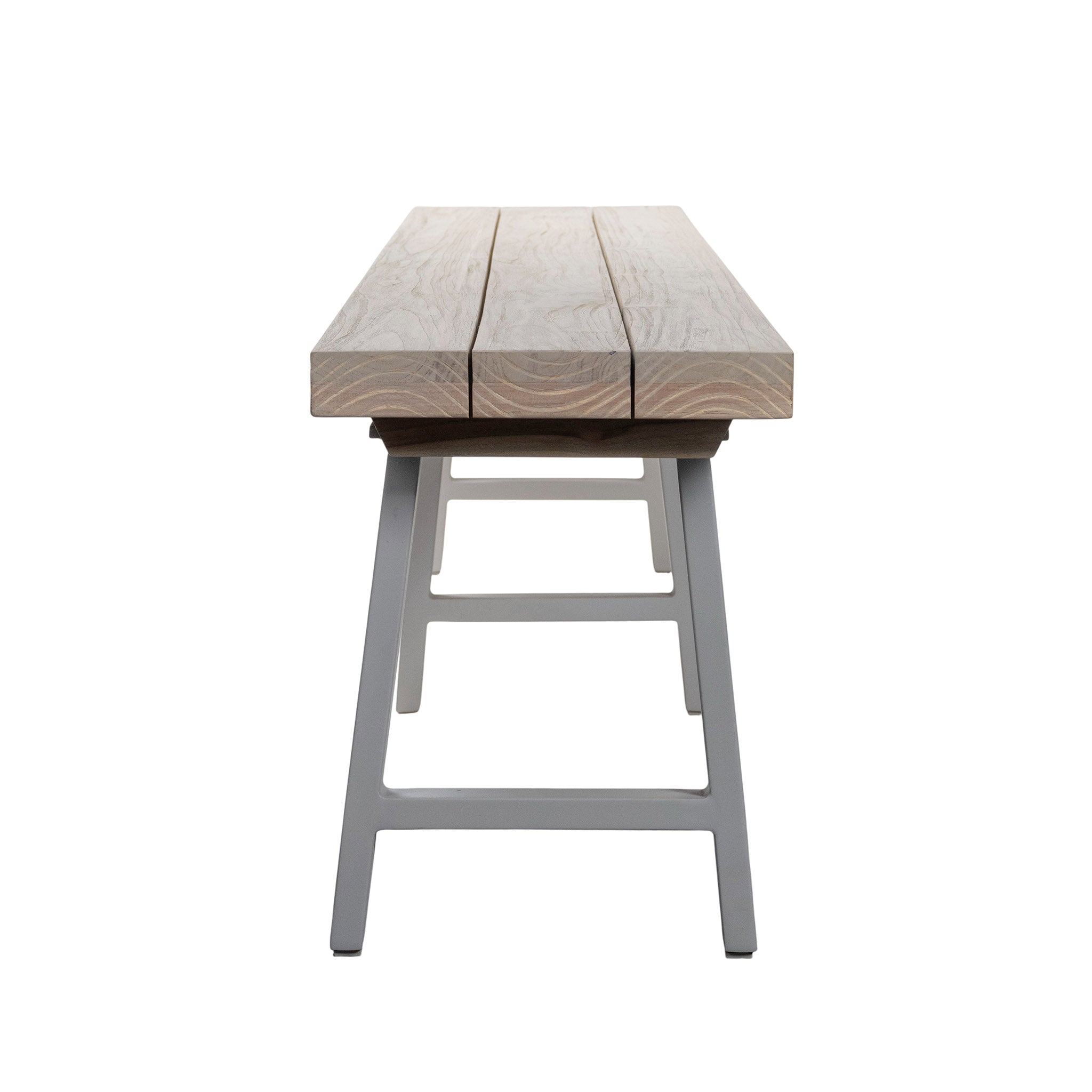 Long wooden bench with linen coloured legs on a white background. End view.