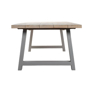 Wooden table with gray metal legs on a white background