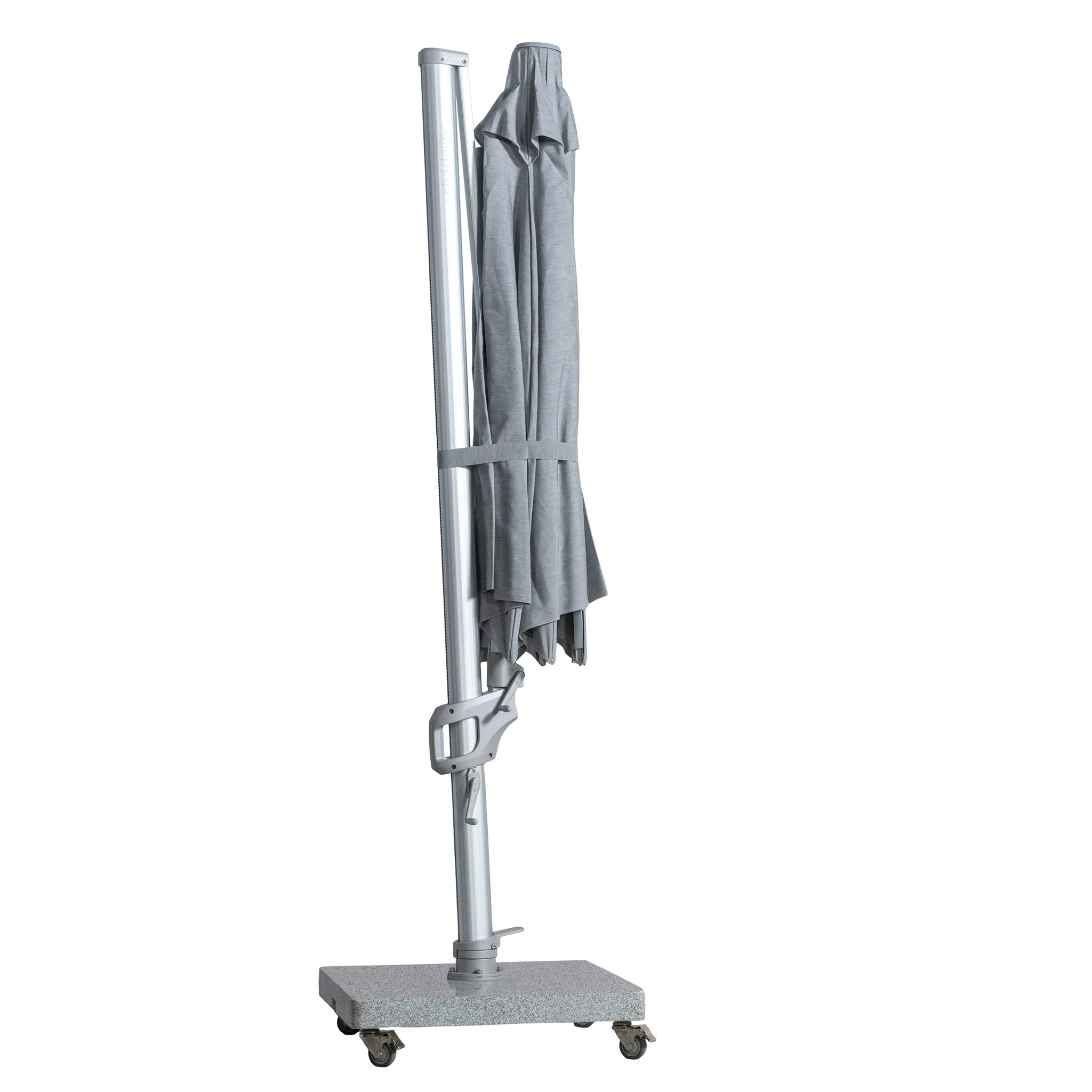 St Tropez round cantilever umbrella with grey coloured canopy collapsed for convenient storage with white background.