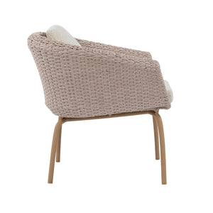 A modern woven armchair with a light beige wicker body, a curved wooden frame, and a small white accent pillow, shown from a three-quarters angle on a white background.
